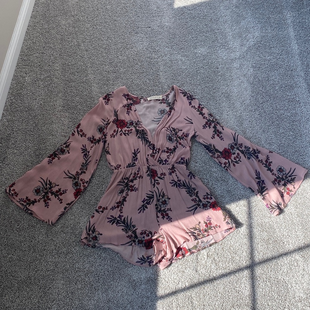 Mauve and floral women’s long sleeve romper.